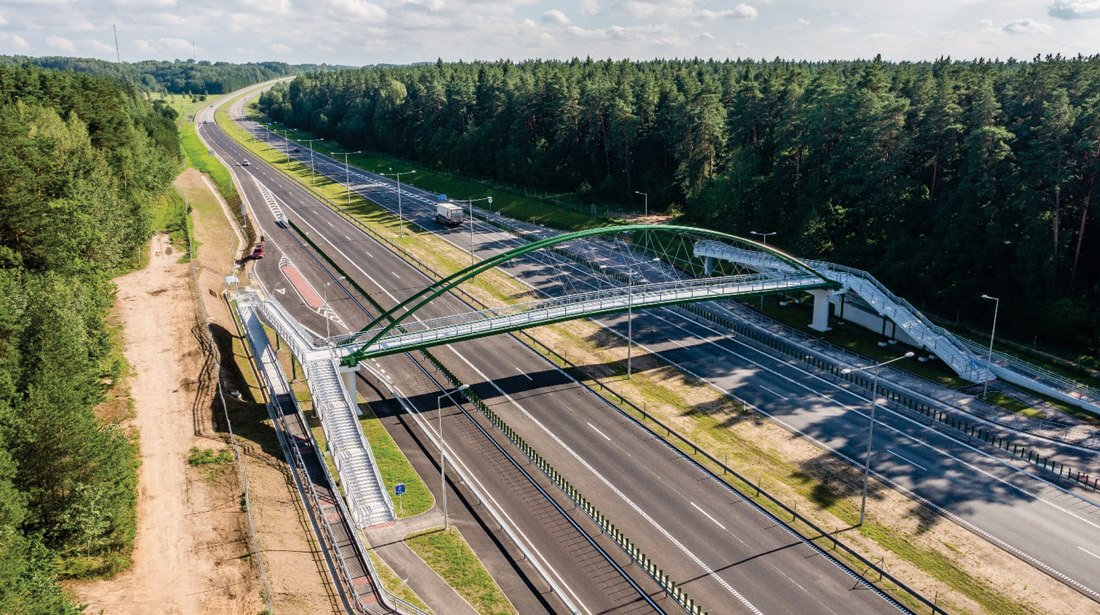 Pėsčiųjų viadukas virš magistralinio kelio A2 Vilnius–Panevėžys (netoli Žemaitkiemio). Statytojas: LAKD, projektuotojas „TEC Infrastructure“. Statinio konstrukcijų dalies vadovas – Vilius Karieta.