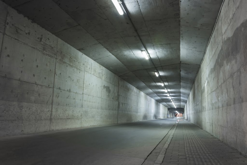 abandoned tunnel with damaged walls